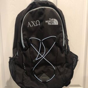 North face backpack with AXO Greek letters